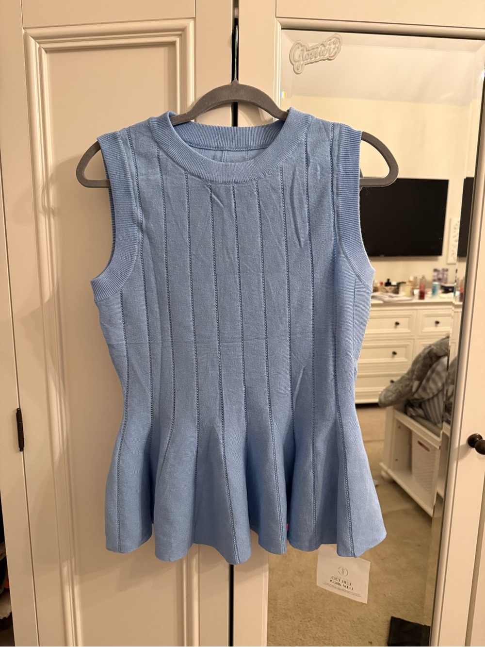 Sleeveless Light Blue Peplum Knit Tank Top